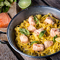 © Weya | stock.adobe.com | (Pieces of salmon with pasta tagliatelle lemon and basil)