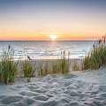 © eyetronic | stock.adobe.com | (Sunset at the dune beach)